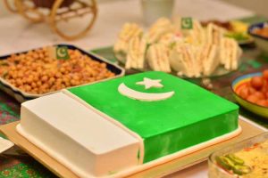 A cake with Pakistan flag on a lunch on the event of national day or independence day celebration family event